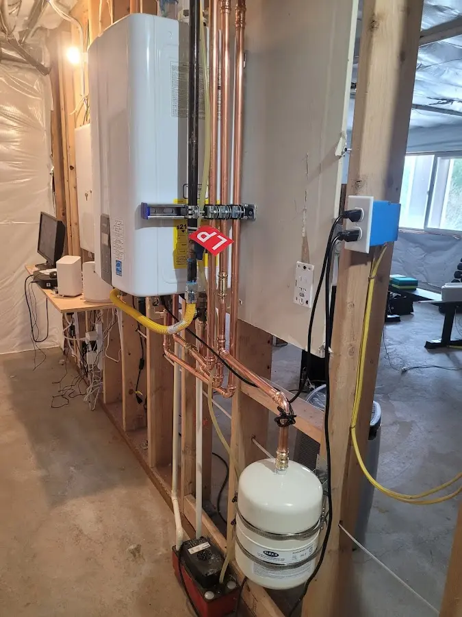 Licensed plumber repairing a kitchen sink in Moravia